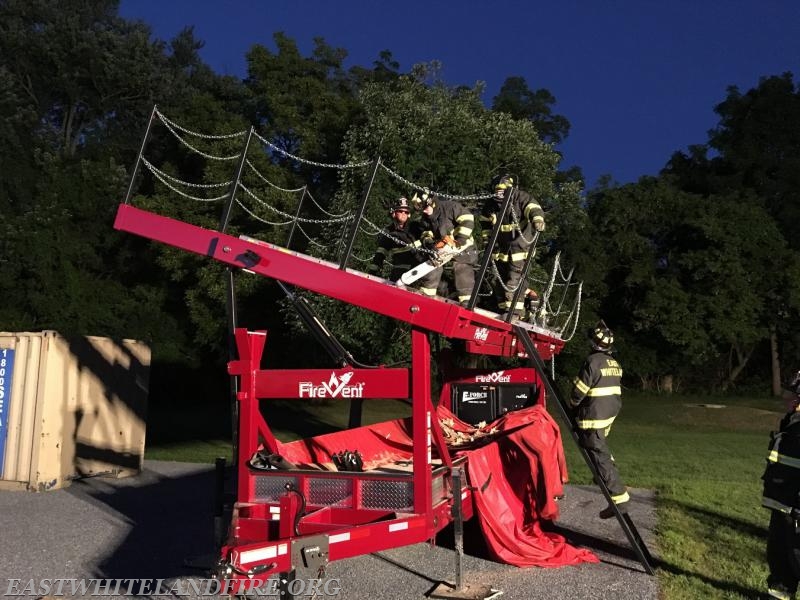 East Whiteland personnel at the Malvern Fire Company for roof ventilation training on a simulated device.