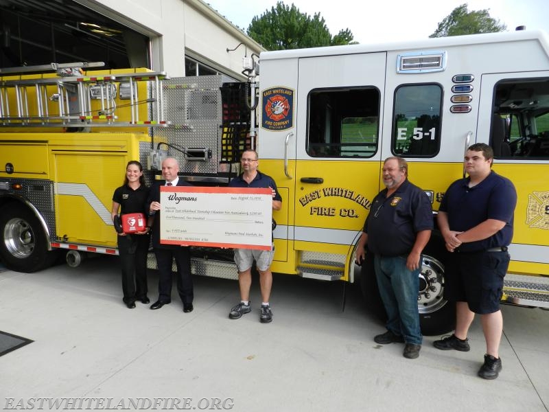 A check for $5,200.00 was donated at Station 5 to help with the purchase of new lifesaving AED units. Amy Miller and Wade Hess from Wegman's Market, Chief Ken Hurley, President Gary Sheridan and EMS Lt. Quintin Lotz.